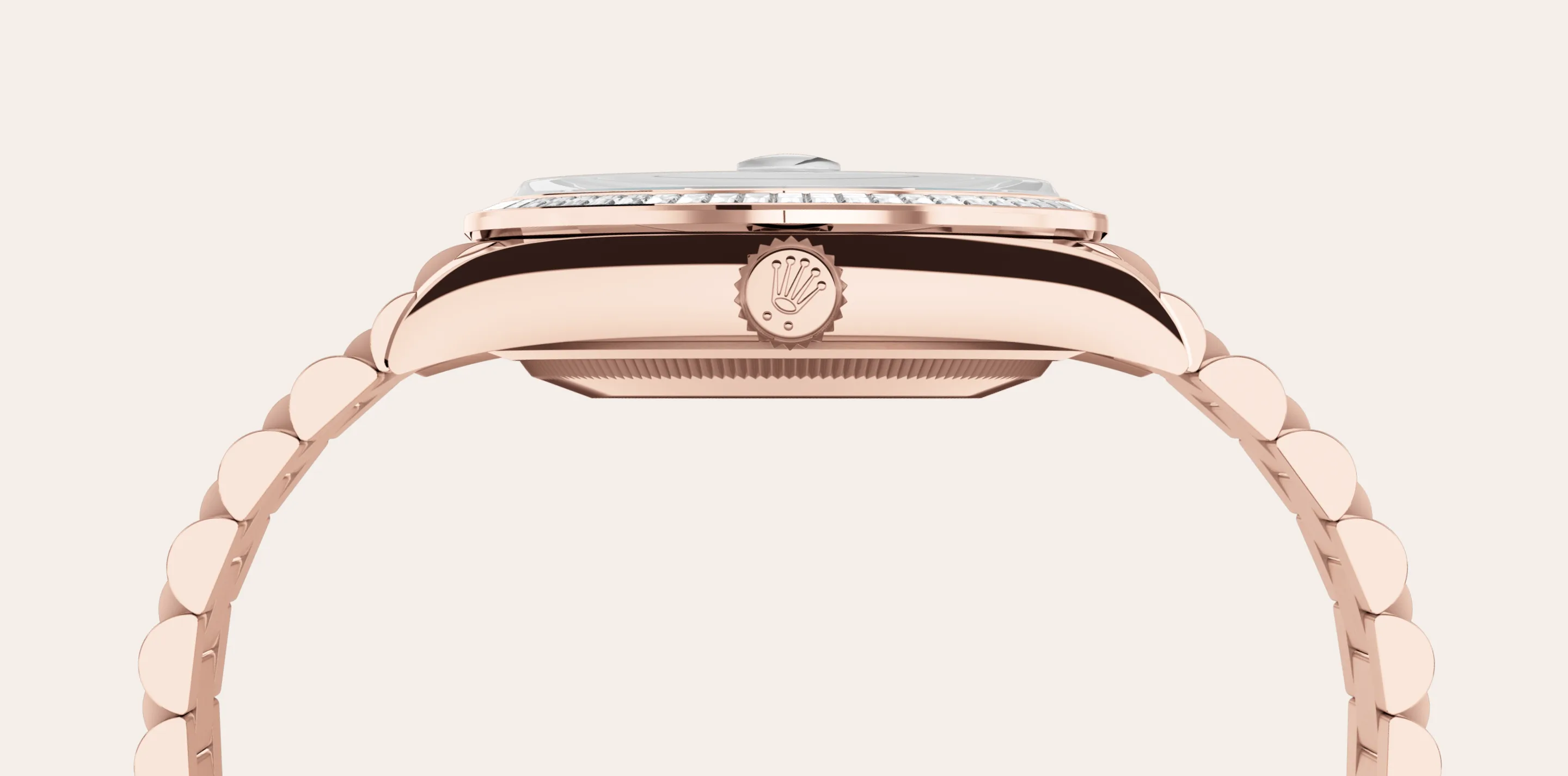 Rolex 
DAY-DATE
Oyster, 36 mm, Everose gold and diamonds
M128395TBR-0032